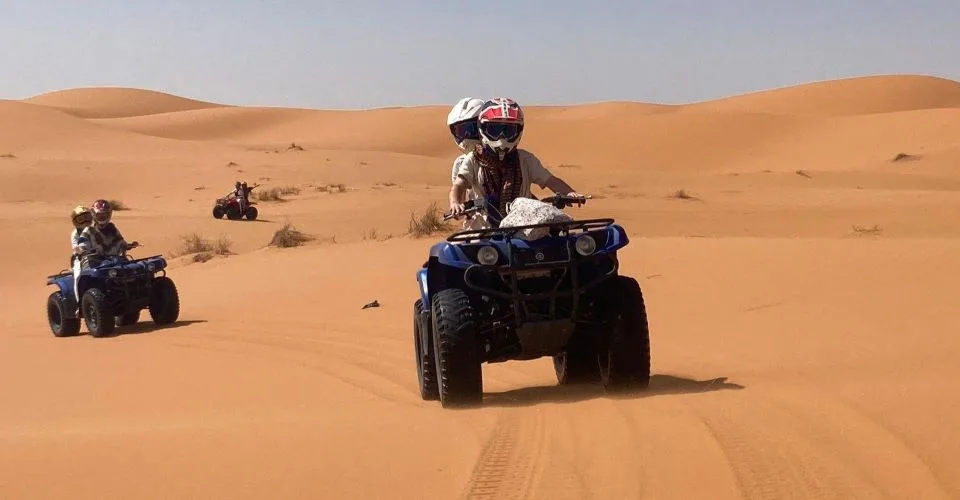 Quad biking adventure on Sahara sand dunes