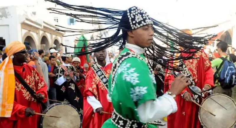 Gnaoua artist playing in streets