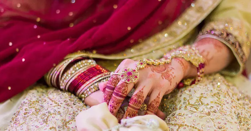Elegant bride wear henna tattoos