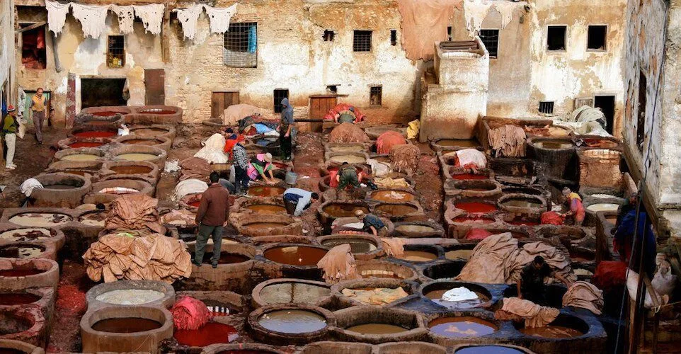 Copper and brassware displayed in a Fes medina workshop