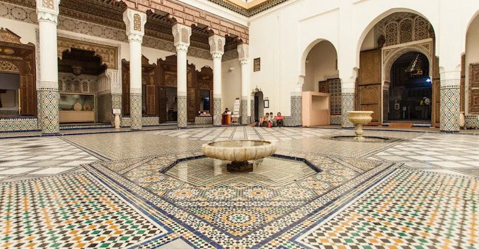 Museum gallery with artefacts and patterned Moroccan interiors