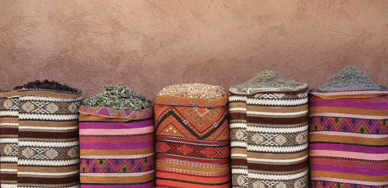 Colourful Moroccan rugs and textiles in a Marrakech souk