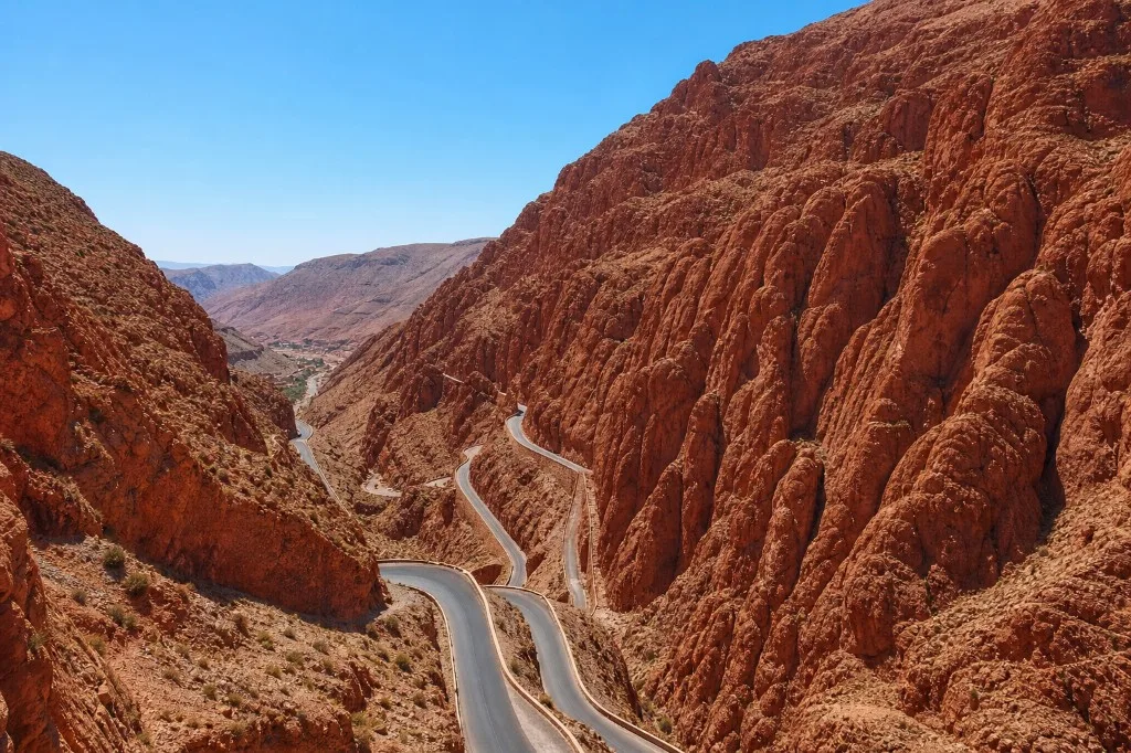 Winding road through the ochre cliffs of the Dades Gorge