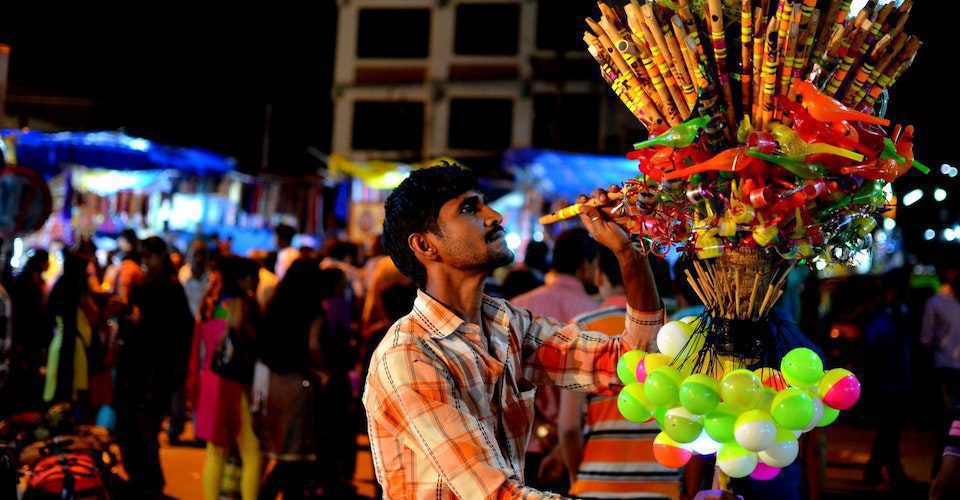 A man sells kinds of toys