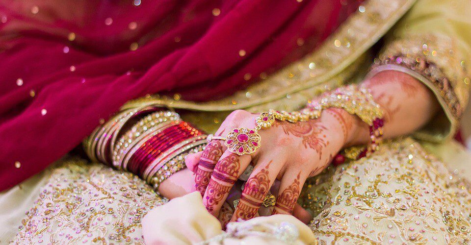 Elegant bride wear henna tattoos
