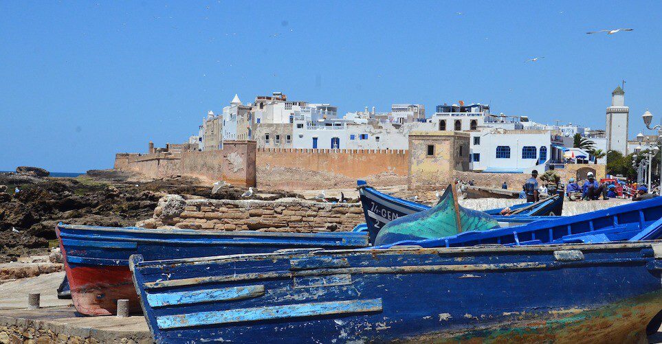 Blue boats lay outside the old medina