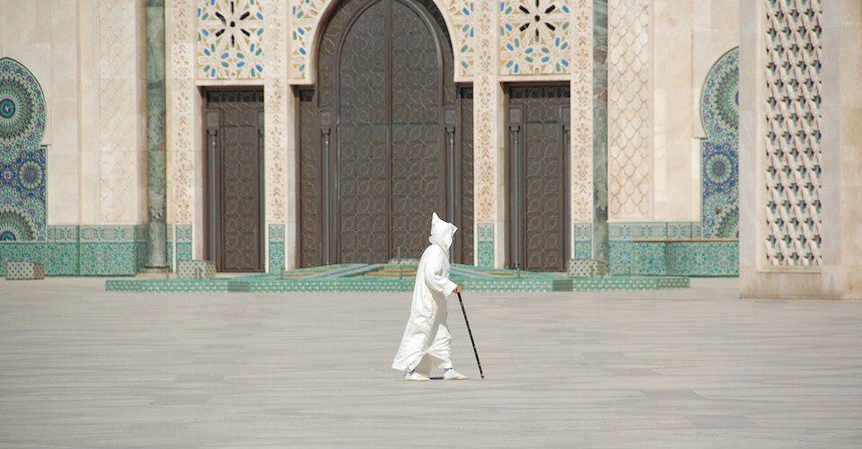 A Moroccan men wear white djellaba