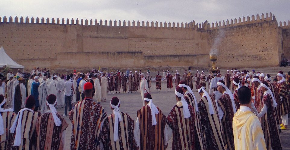 Moroccan people dance in a circle
